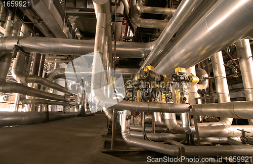 Image of Industrial zone, Steel pipelines and cables in yellow tones