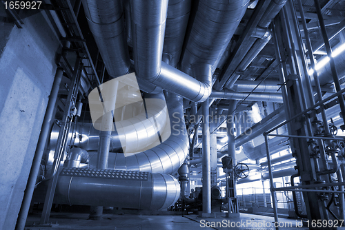 Image of Industrial zone, Steel pipelines and cables in blue tones