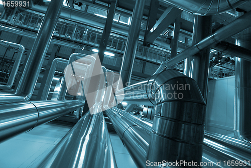 Image of Industrial zone, Steel pipelines and cables in blue tones