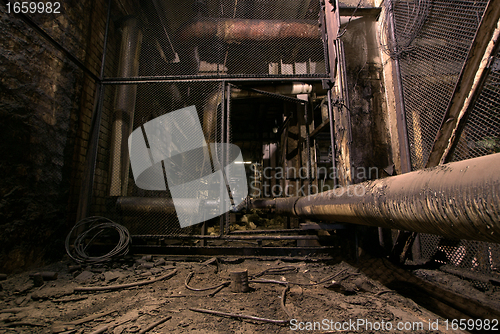 Image of old creepy dark decaying dirty factory