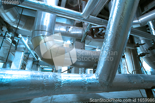 Image of Industrial zone, Steel pipelines and cables in blue tones