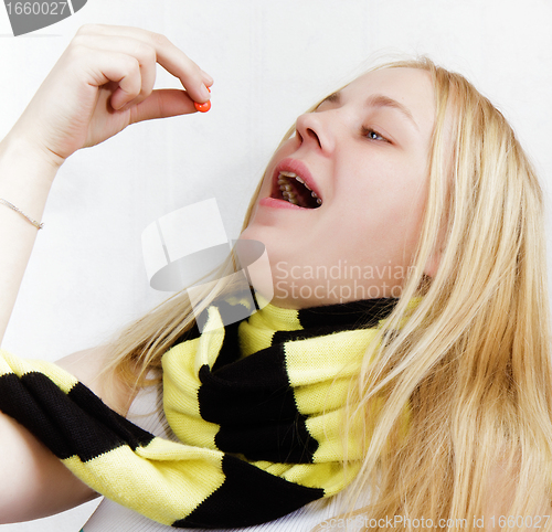 Image of girl with pills.treatment