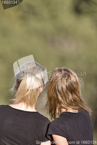 Image of 2 girls looking