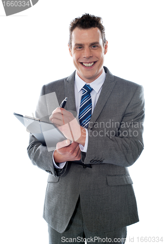 Image of Businessman with clipboard