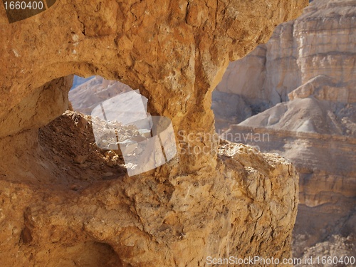 Image of Window in the orange sandstone rock in stone desert