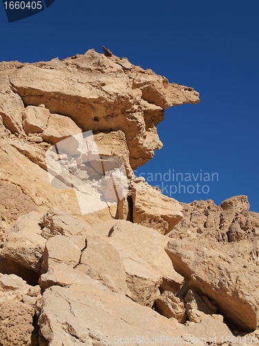 Image of Scenic weathered yellow rock in stone desert