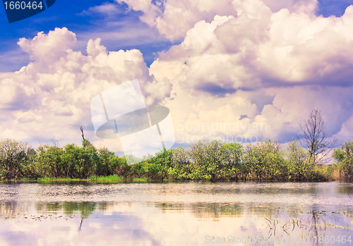 Image of Clouds reflection on lake.
