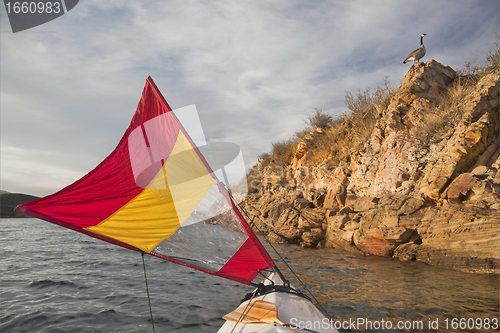 Image of sailing canoe on a lake in Colorado