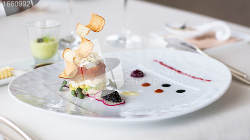 Image of Appetizer with crab, salmon and vegetables