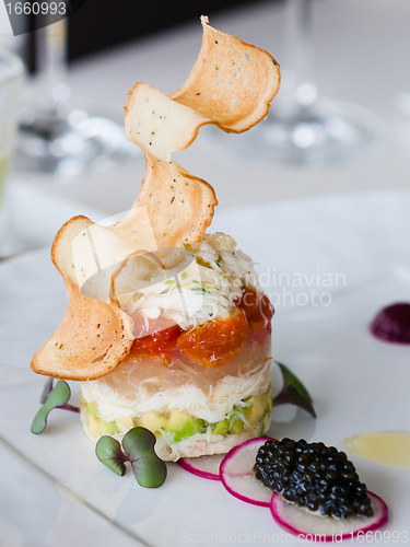 Image of Appetizer with crab, salmon and vegetables