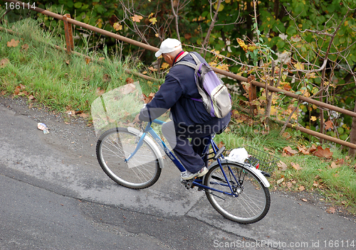 Image of Man on bicycle
