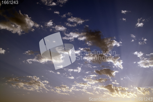 Image of Sunset sky with sunbeams