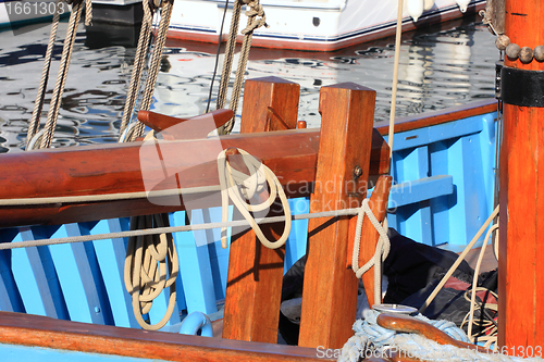 Image of details of an old fishing boat sailing out of wood