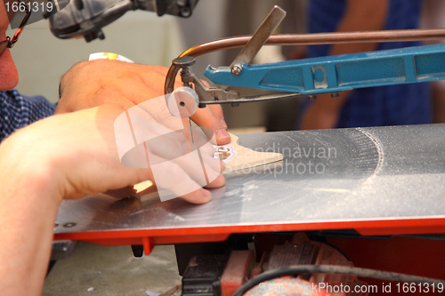 Image of precise cutting of a wood panel for decoration