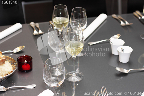 Image of glasses, cutlery on the table a great restaurant