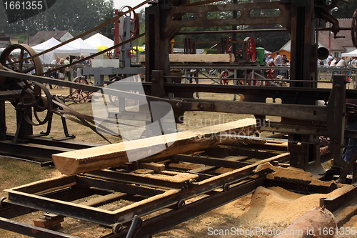 Image of old wood sawing machine of the 1930s