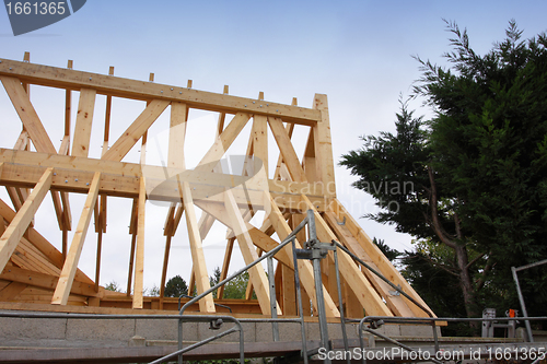Image of construction of the wooden frame of a roof