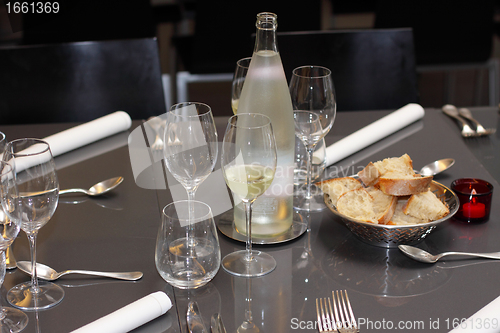 Image of glasses, cutlery on the table a great restaurant