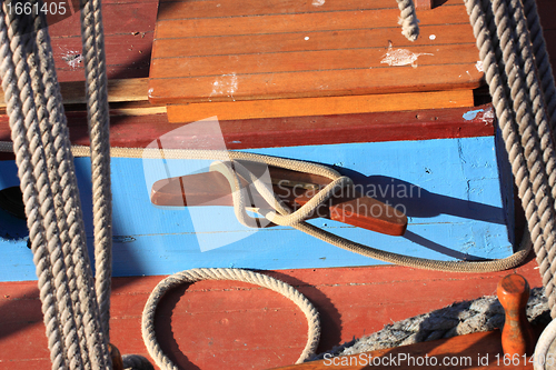 Image of details of an old fishing boat sailing out of wood