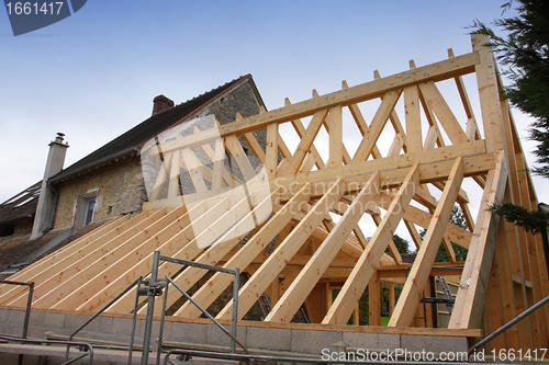 Image of construction of the wooden frame of a roof