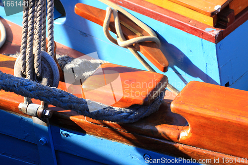 Image of details of an old fishing boat sailing out of wood