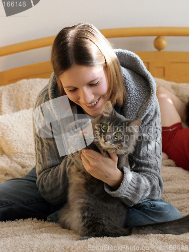 Image of Girl with a kitten