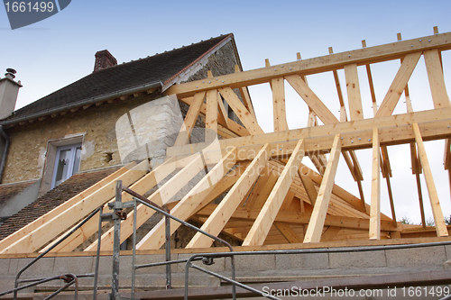 Image of construction of the wooden frame of a roof