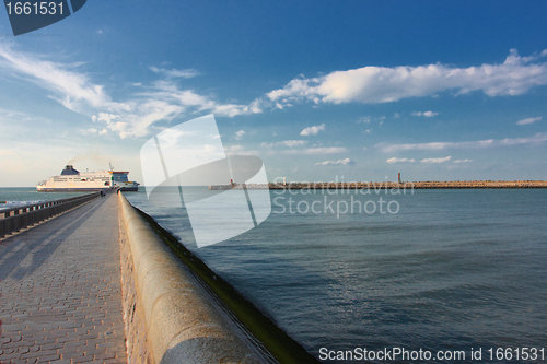 Image of ferry boat entering in the channel of the port of Calais