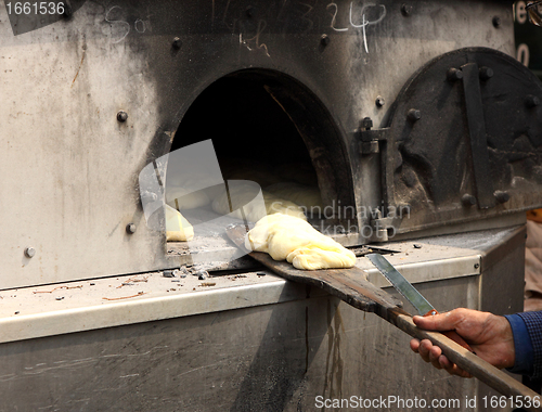 Image of bread has been baked in an oven on a wooden pallet