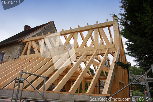 Image of construction of the wooden frame of a roof
