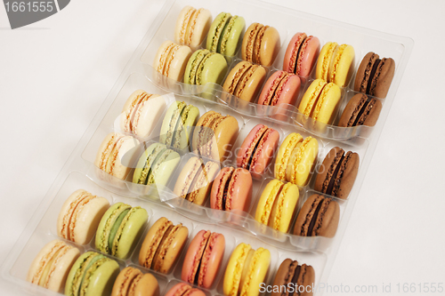 Image of assortment of macaroons on a white background