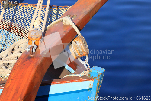 Image of details of an old fishing boat sailing out of wood