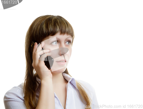 Image of young woman talking on a cell phone