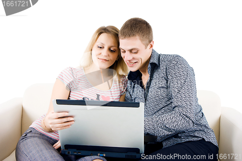 Image of couple with laptop