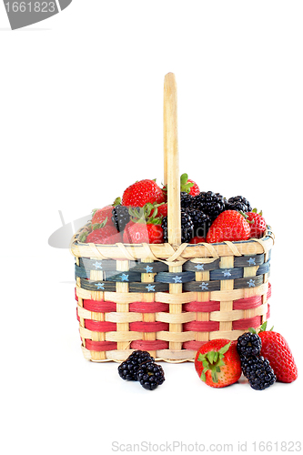 Image of Patriotic basket of fresh strawberries and blackberries.