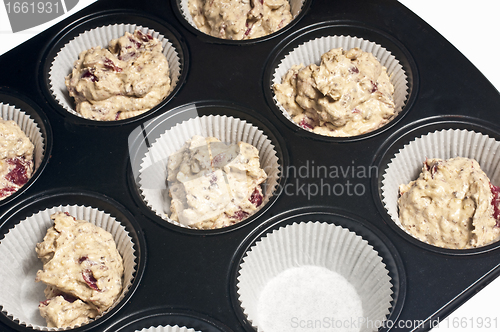 Image of filled muffin tray