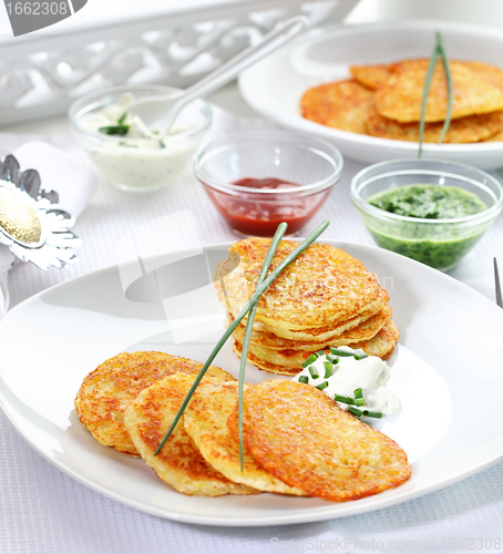 Image of Potato pancakes with three dips