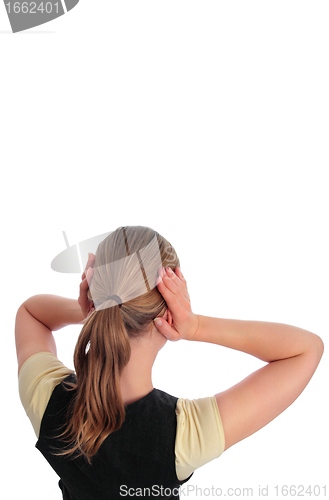 Image of Woman blocking her ears