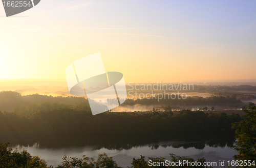 Image of daybreak in the mist of the valley of the Seine