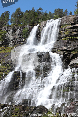 Image of Big waterfall in a fjord it norvege in spring