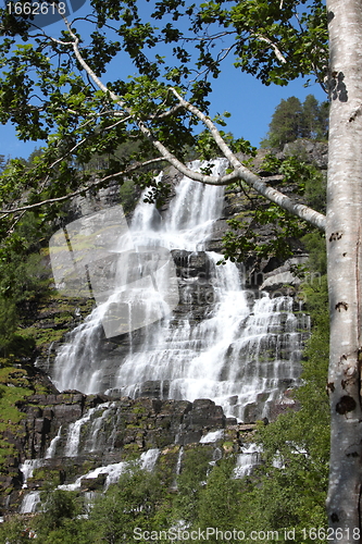 Image of Big waterfall in a fjord it norvege in spring