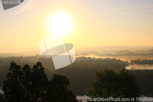 Image of daybreak in the mist of the valley of the Seine