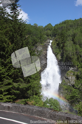 Image of Big waterfall in a fjord it norvege in spring