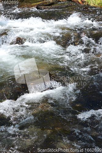 Image of Big waterfall in a fjord it norvege in spring