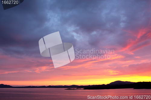 Image of sunset view from a boat off the coast of norway