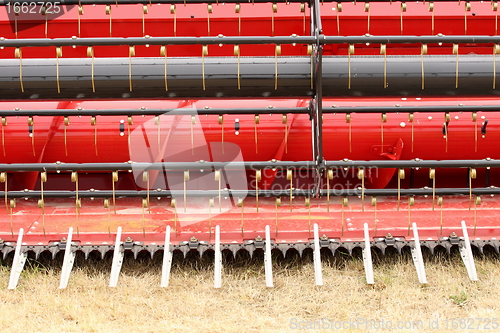 Image of close-up view of the front of a combine harvester