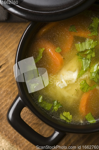 Image of Chicken soup in the ceramic bowl 