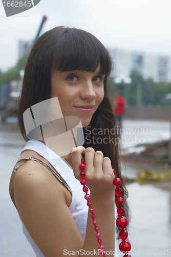 Image of Girl with red beads