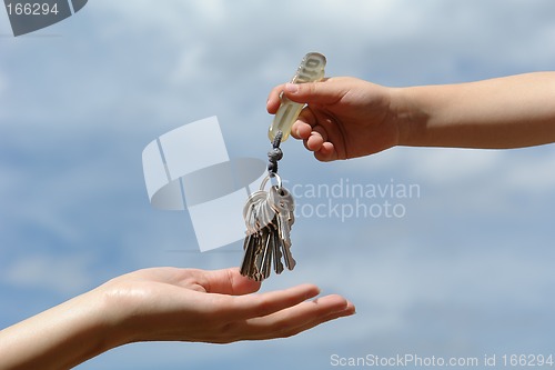 Image of child's hand with keys