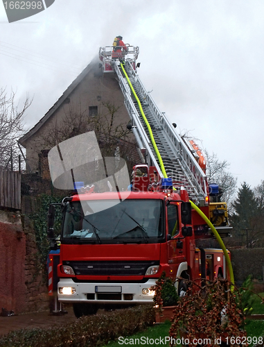 Image of fireman on ladder